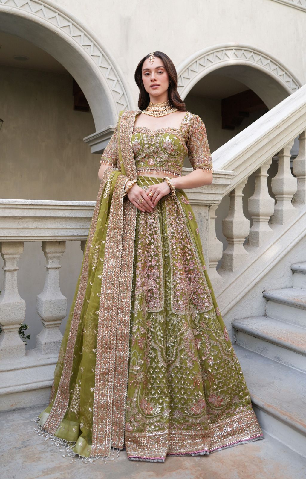 AZRINA Olive Green Net Lehenga | Pakistani Wedding Dress for Mehndi & Festive Wear YourLibaas AZRINA Olive Green Net Lehenga | Pakistani Wedding Dress for Mehndi & Festive Wear YourLibaas